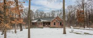 SOLD | 11540 Woodmont, Pinckney, MI | Spacious Custom Brick Ranch