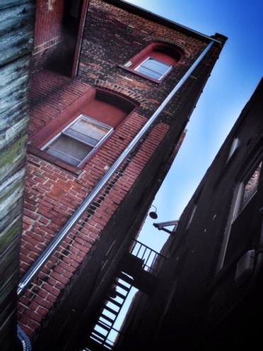 Blue Sky. Dark Alley